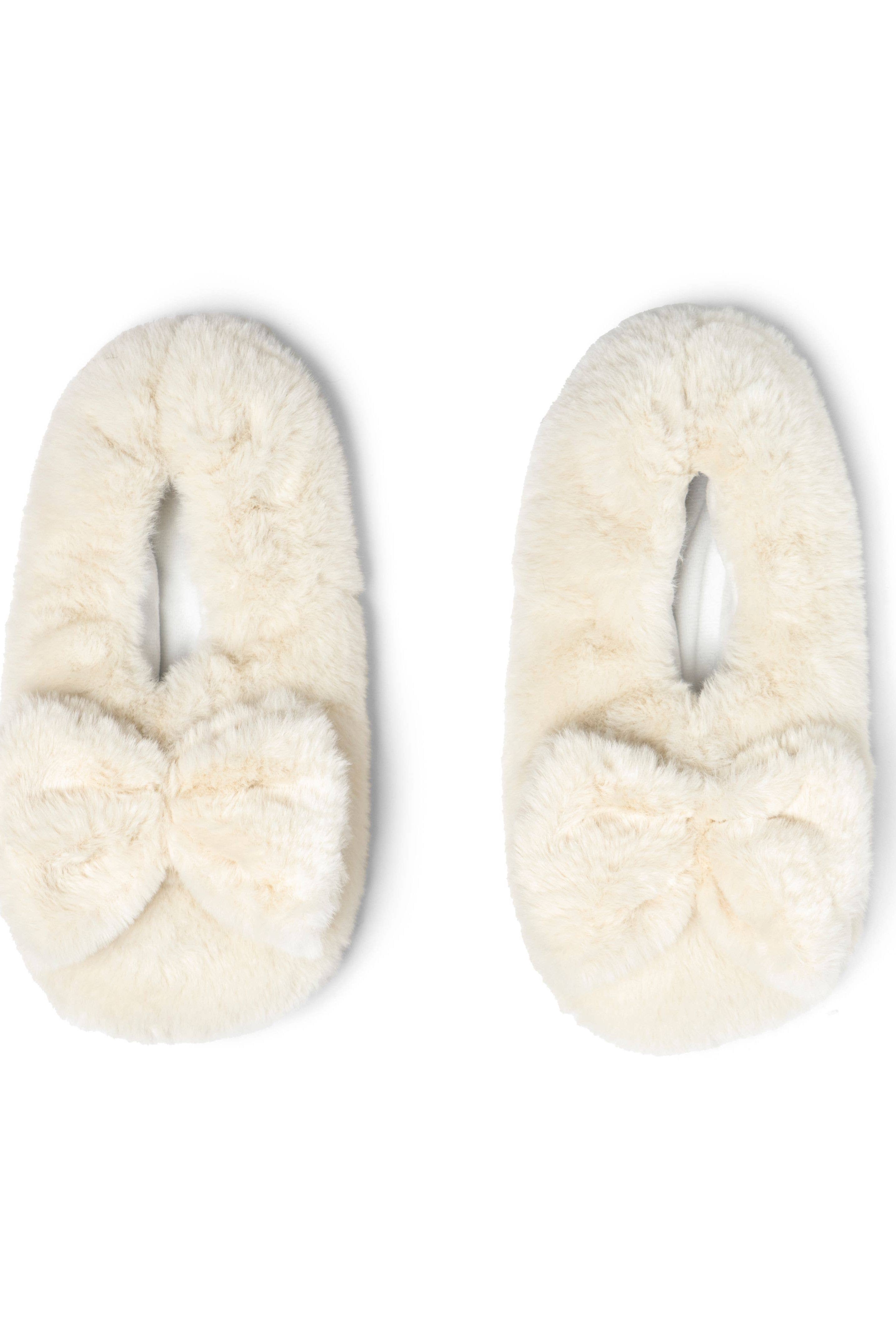cream colored microwavable plush heated slippers with weighted spa bead upper