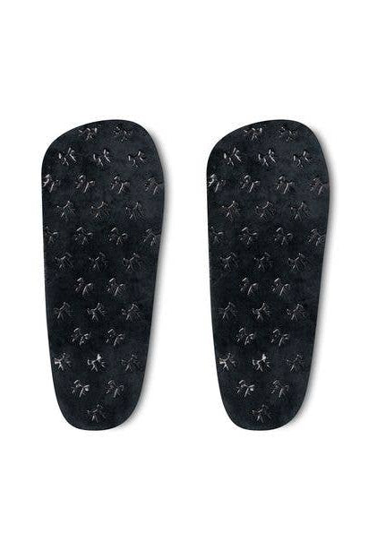 soles grips of the microwavable plush heated slippers with weighted spa bead upper