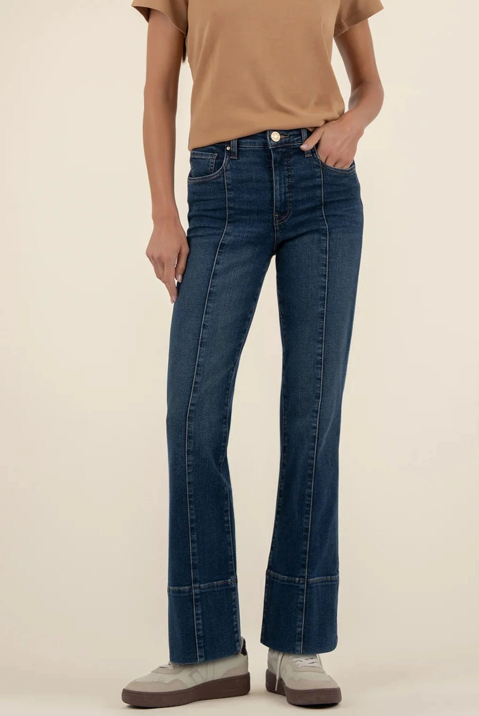 person wearing the kelsey hi rise fab ab denim with front seam in the color, envision / dark wash denim