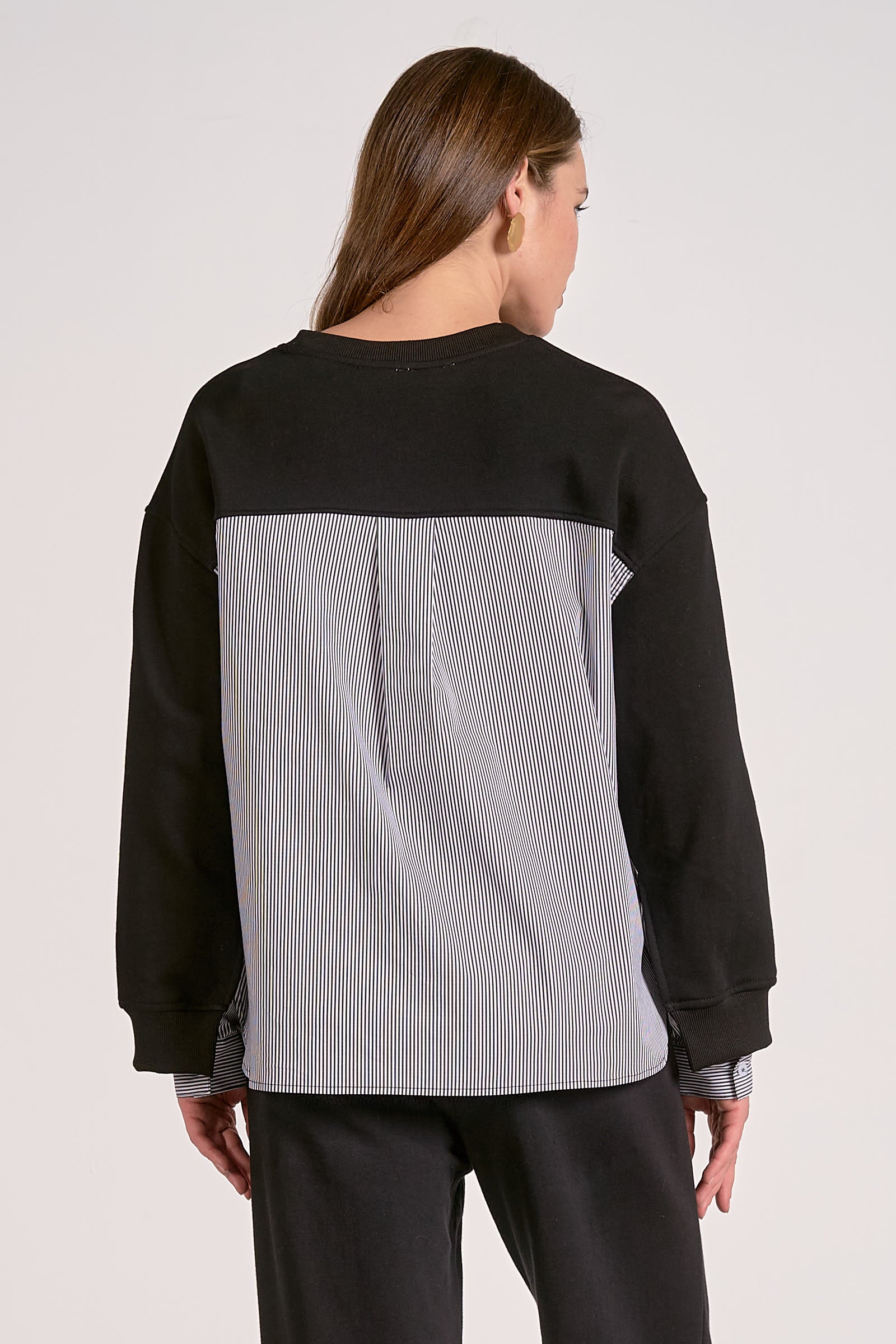 Black mixed media crewneck sweatshirt with striped woven back back view