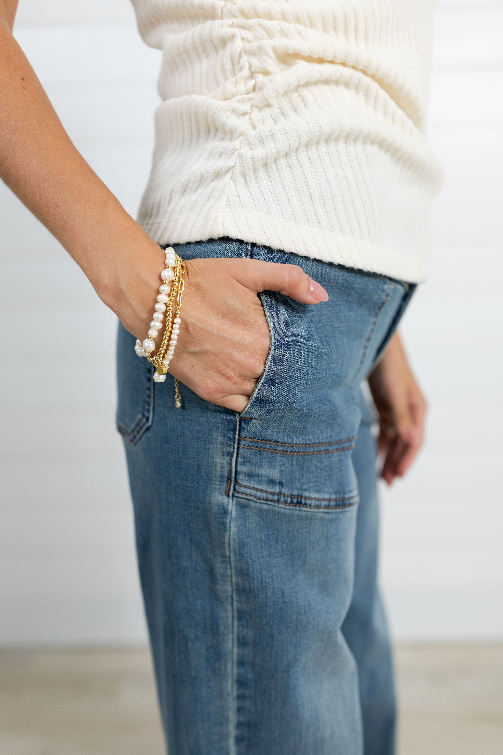 Closeup view of the Mac and Me Porkchop Pocket Wide Leg Jeans in medium blue