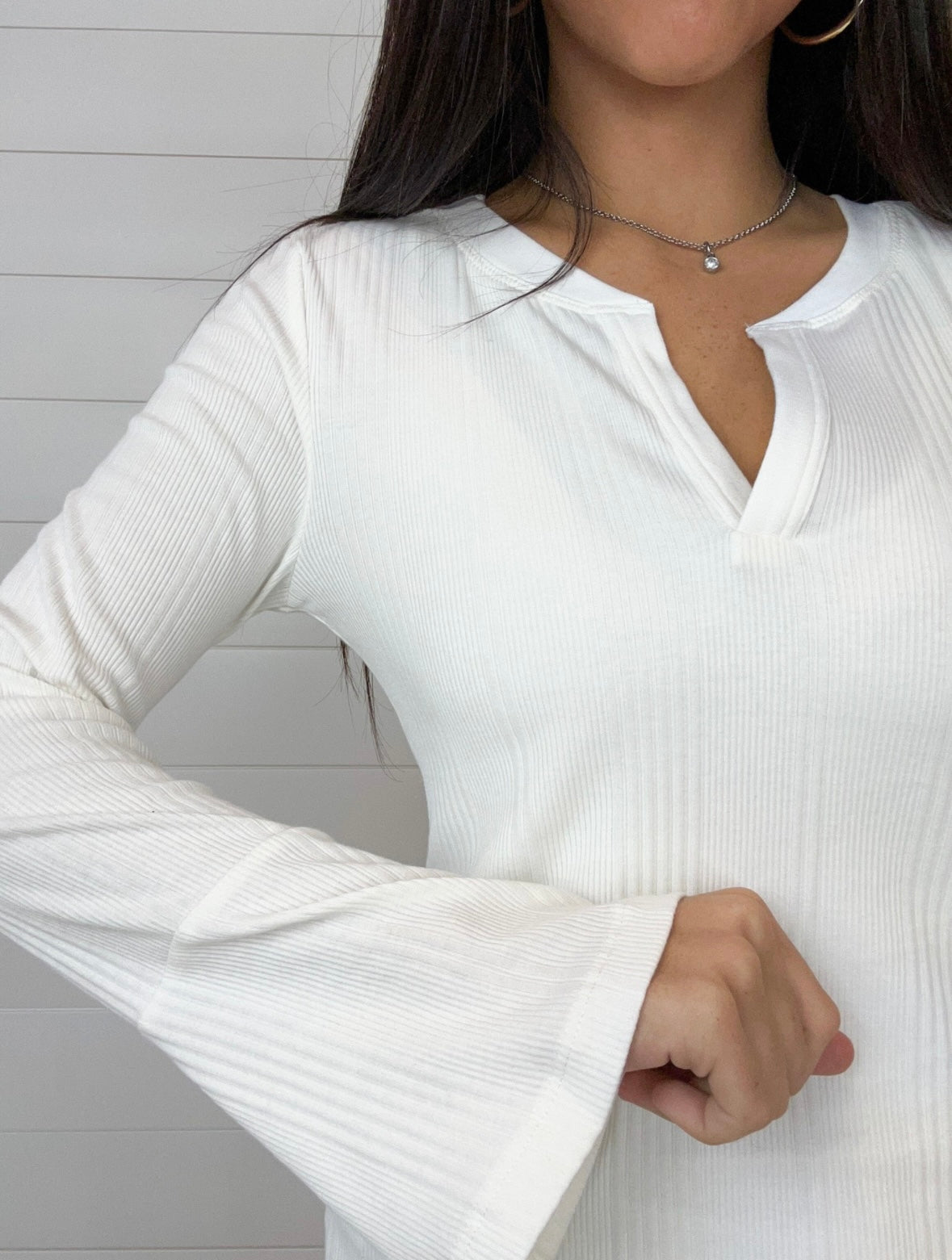Sleeve detail on the white bell sleeve ribbed top from Mac and Me