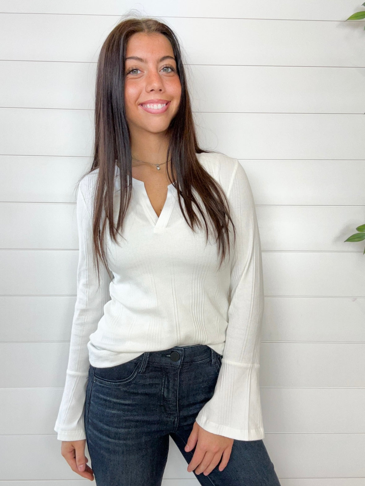 Model showing the front of the Mac and Me bell sleeve rib top