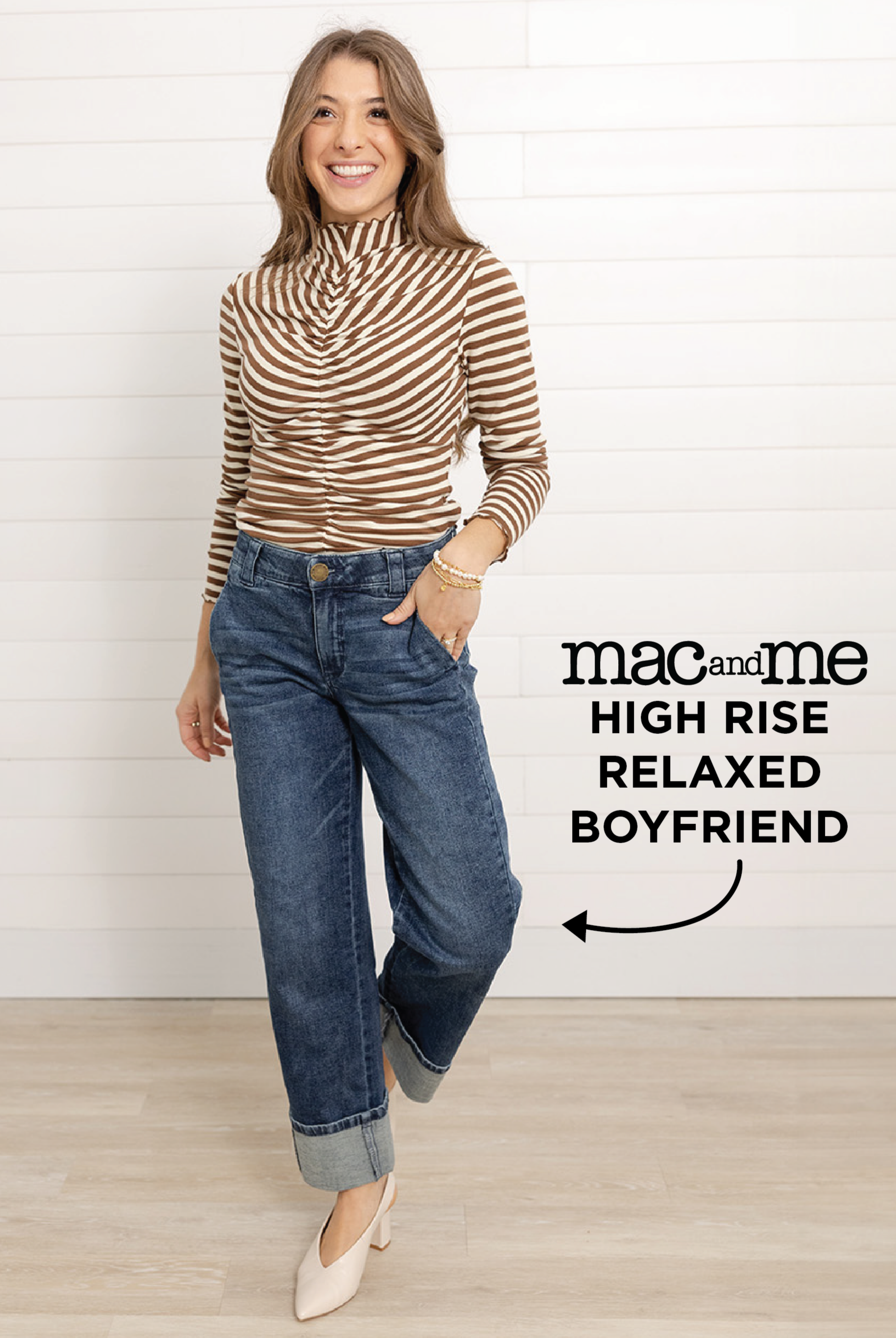 Model wearing the relaxed boyfriend jeans with a 4" cuff in the color Blue Artisinal.
