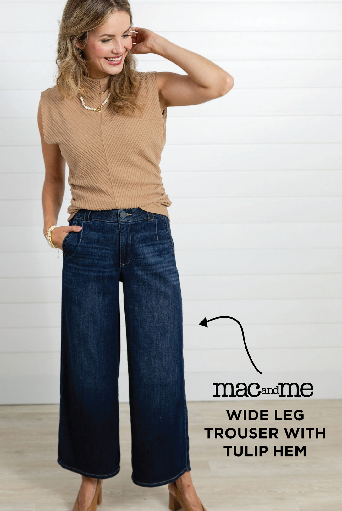 A woman wearing the Mac and Me Wide Leg Trouser with Tulip Hem with a the camel colored Funnel Neck Mac and Me in the color, Carmel. She is also wearing camel colored slingback shoes. This outfit styled together creates a stylish fall staple