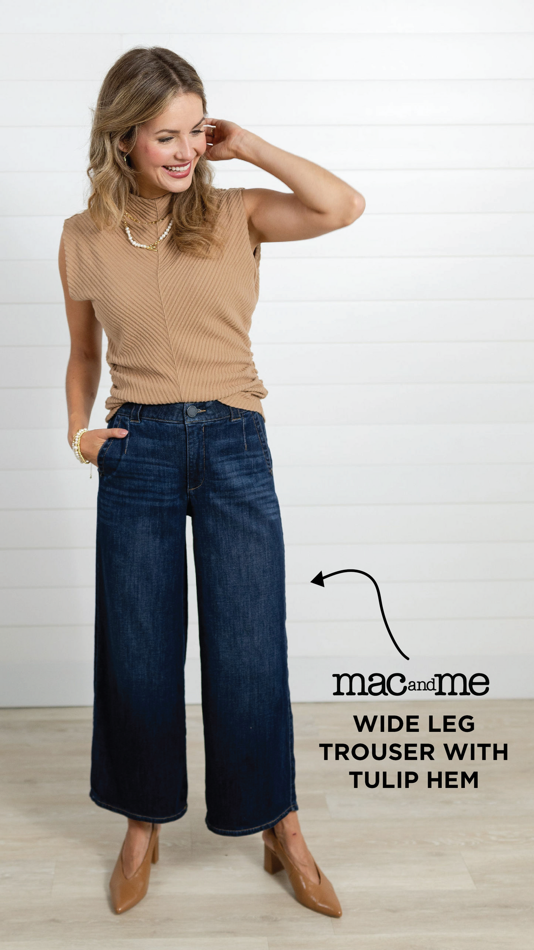 A woman wearing the Mac and Me Wide Leg Trouser with Tulip Hem with a the camel colored Funnel Neck Mac and Me in the color, Carmel. She is also wearing camel colored slingback shoes. This outfit styled together creates a stylish fall staple