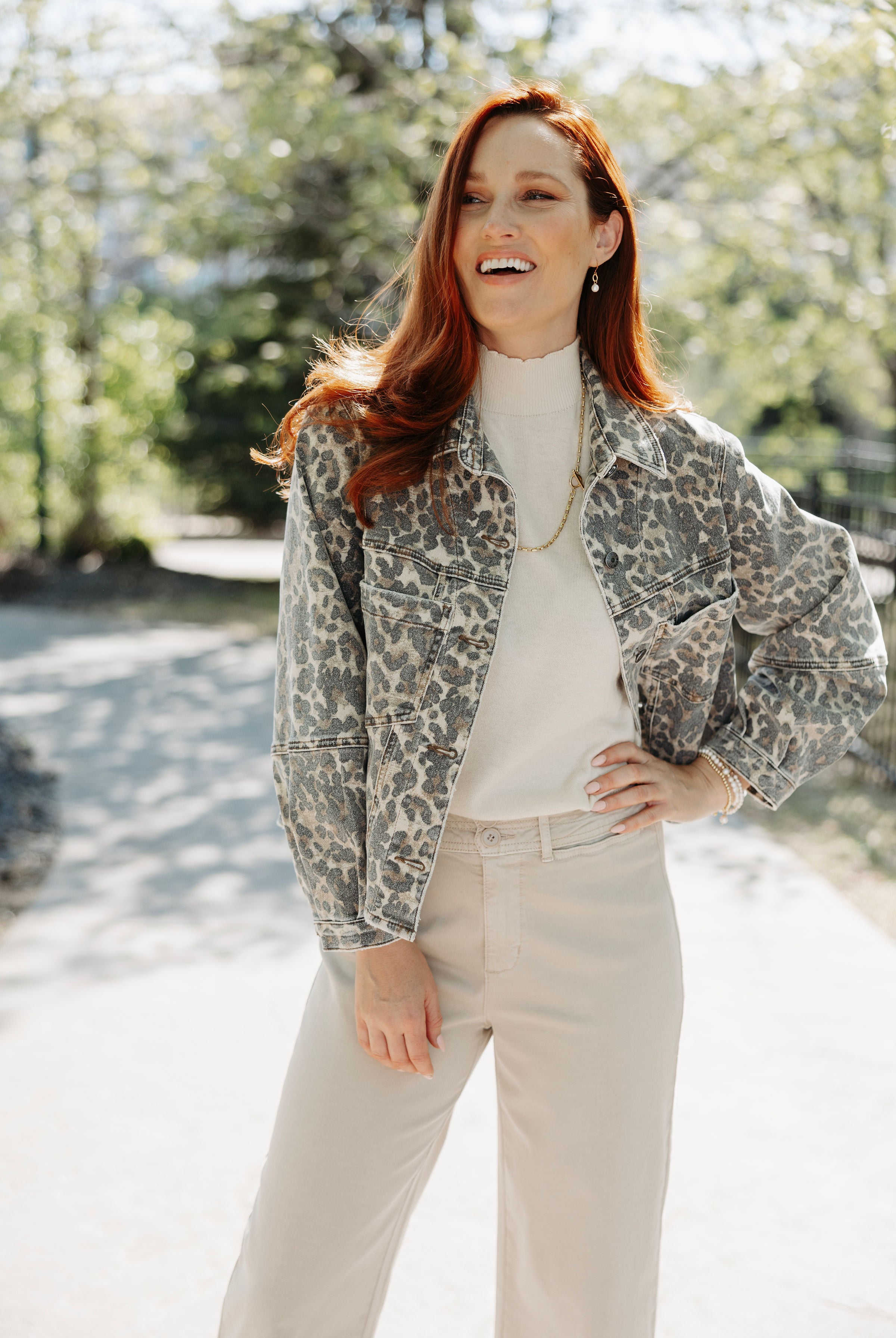 Woman wearing the animal print jacket from Mainstream Boutique Bloomington