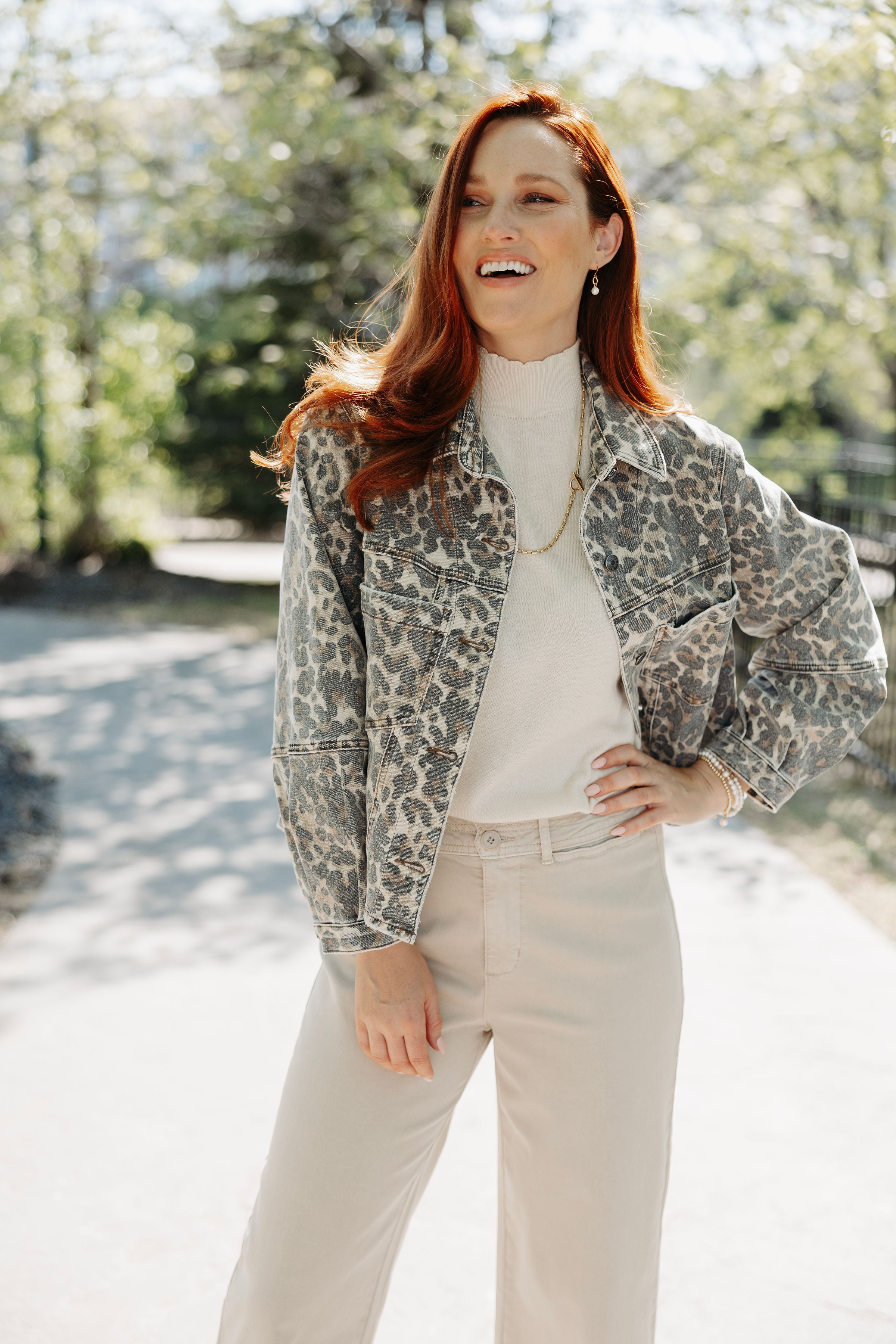 Woman wearing the animal print jacket from Mainstream Boutique Bloomington