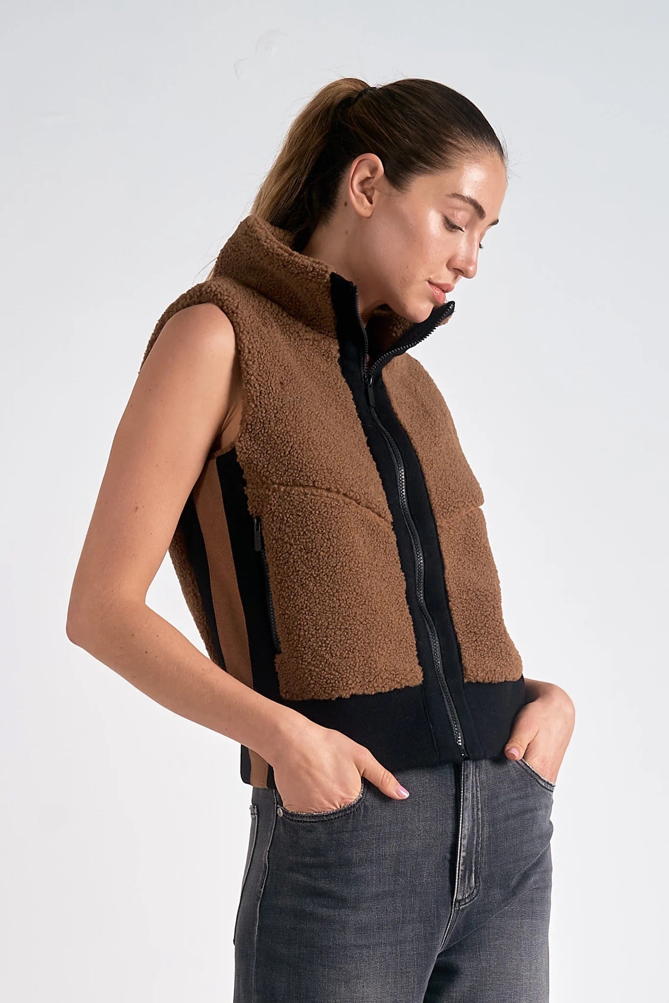 teddy sherpa zip up vest in brown with black trim