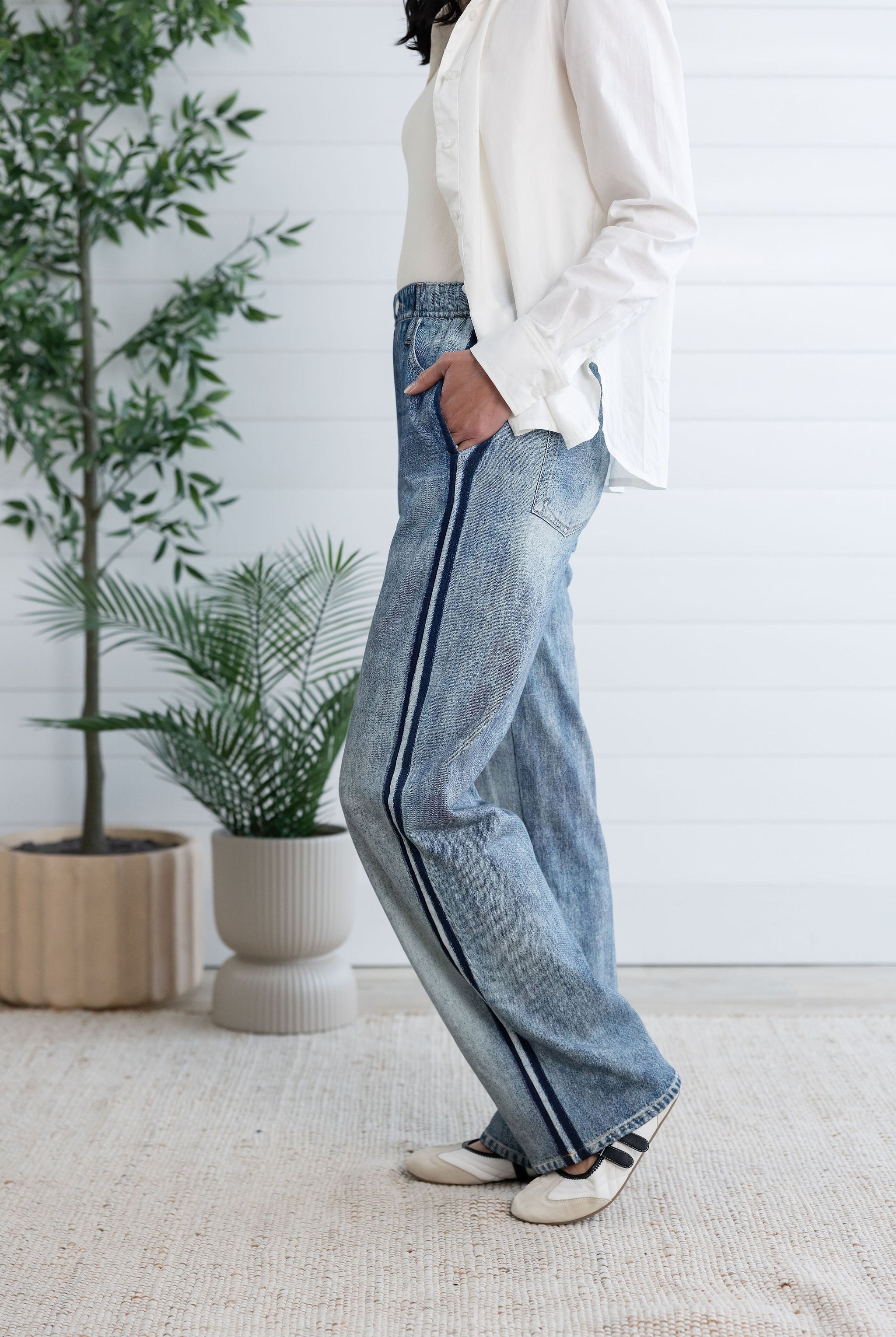 woman modeling side of lounge pant, the light blue Side Stripe Relaxed Denim Pant