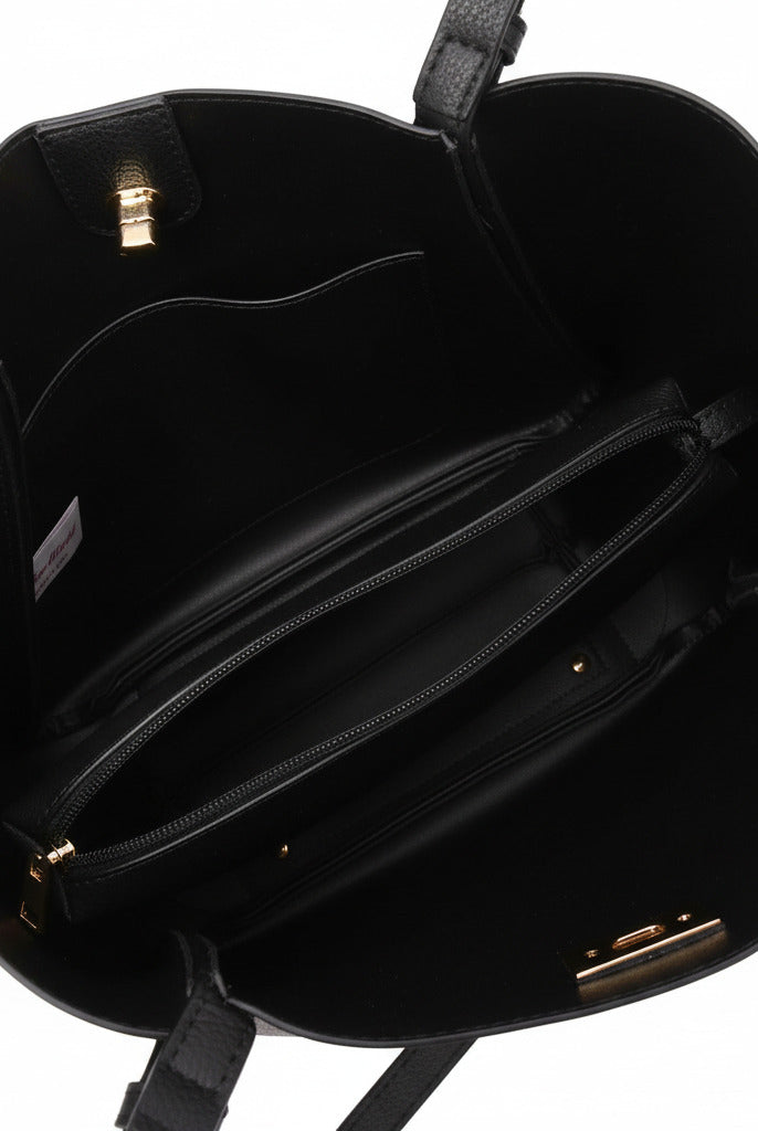 Showing the interior portion of the Brookly tote with the compartments and the tote inside