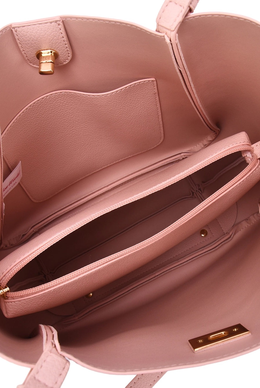 Showing the interior portion of the Brookly tote with the compartments and the tote inside.