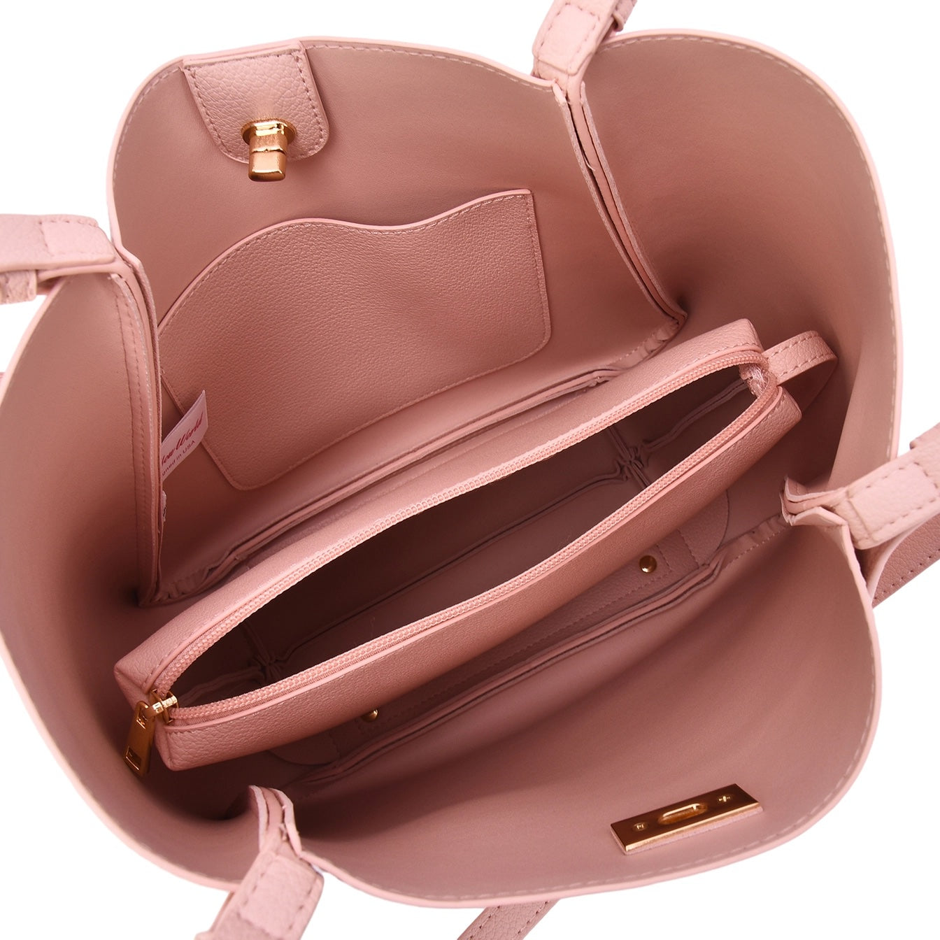 Showing the interior portion of the Brookly tote with the compartments and the tote inside.