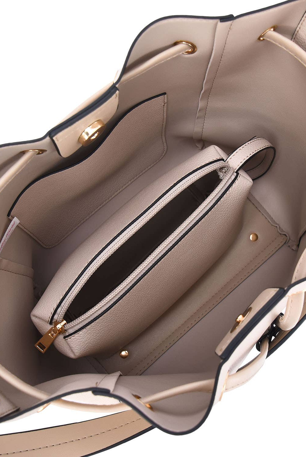 Showing the interior of the Ashby Handbag and the tote inside.