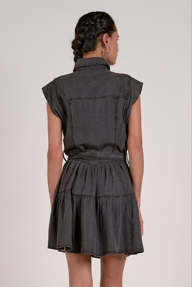 back side of the Black washed denim dress with tie waist from Mainstream Boutique Bloomington