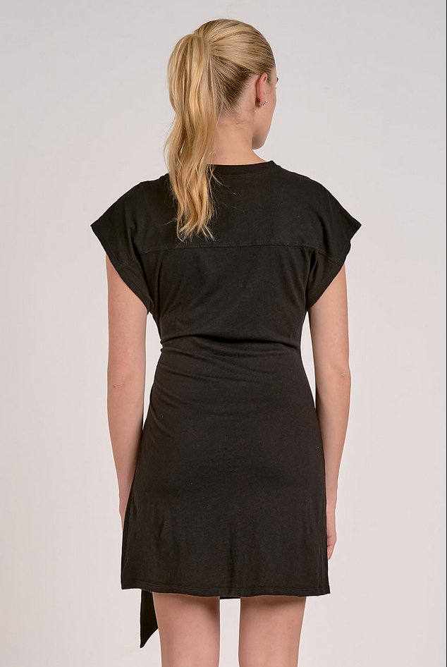 back of simple black dress with flattering waist tie and relaxed fit