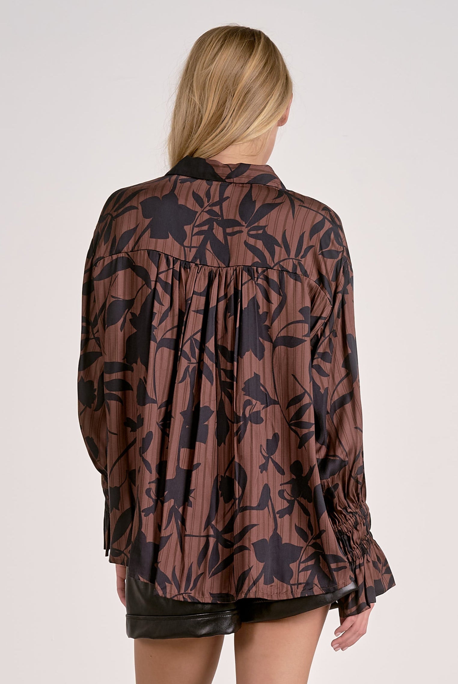 back of brown foliage blouse