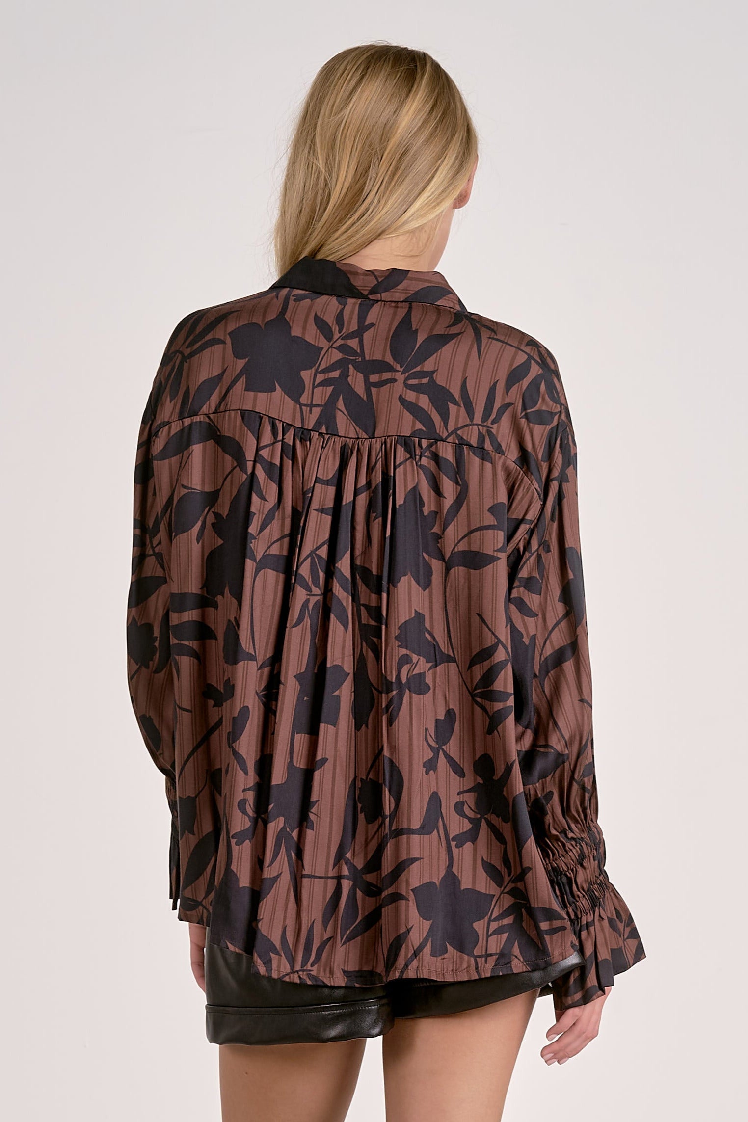 back of brown foliage blouse