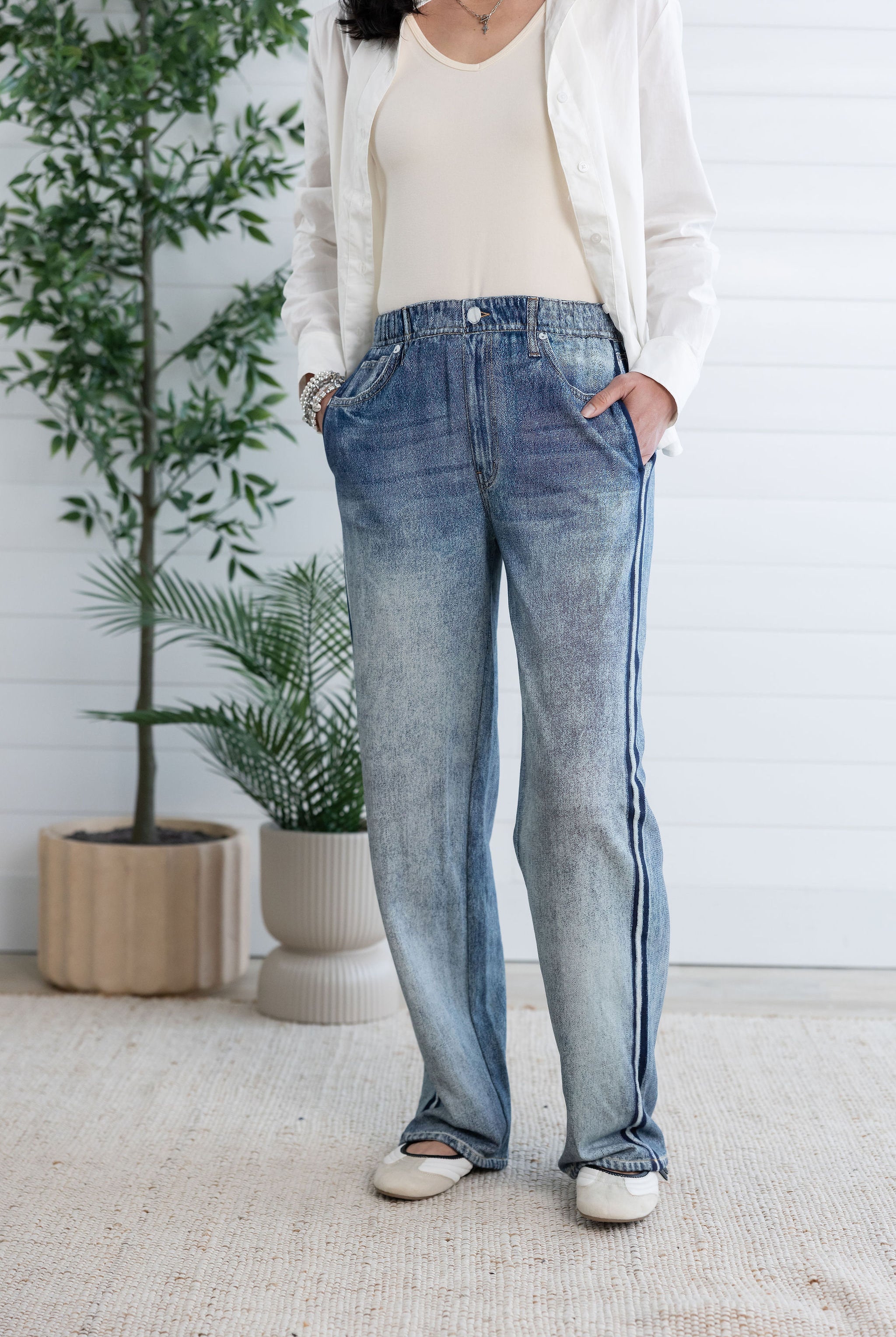 woman modeling front of lounge pant, the light blue Side Stripe Relaxed Denim Pant