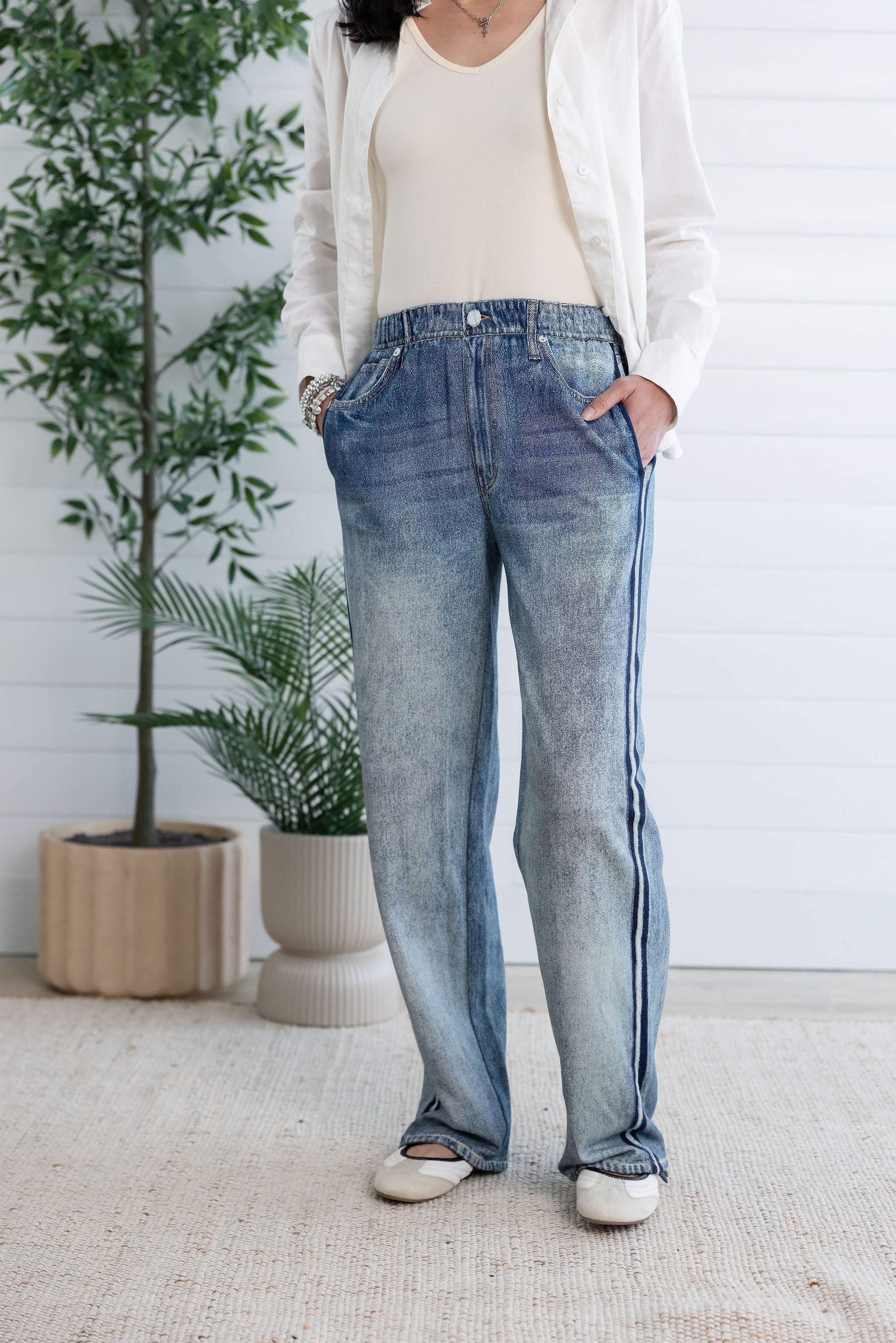woman modeling front of lounge pant, the light blue Side Stripe Relaxed Denim Pant