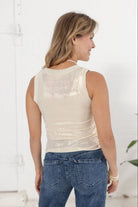 woman modeling the back of the white glitter tank at Mainstream Boutique Bloomington