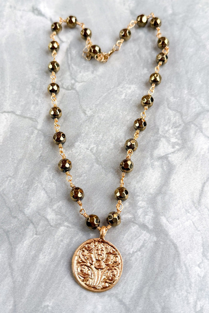 gold and bead short necklace with coin pendant