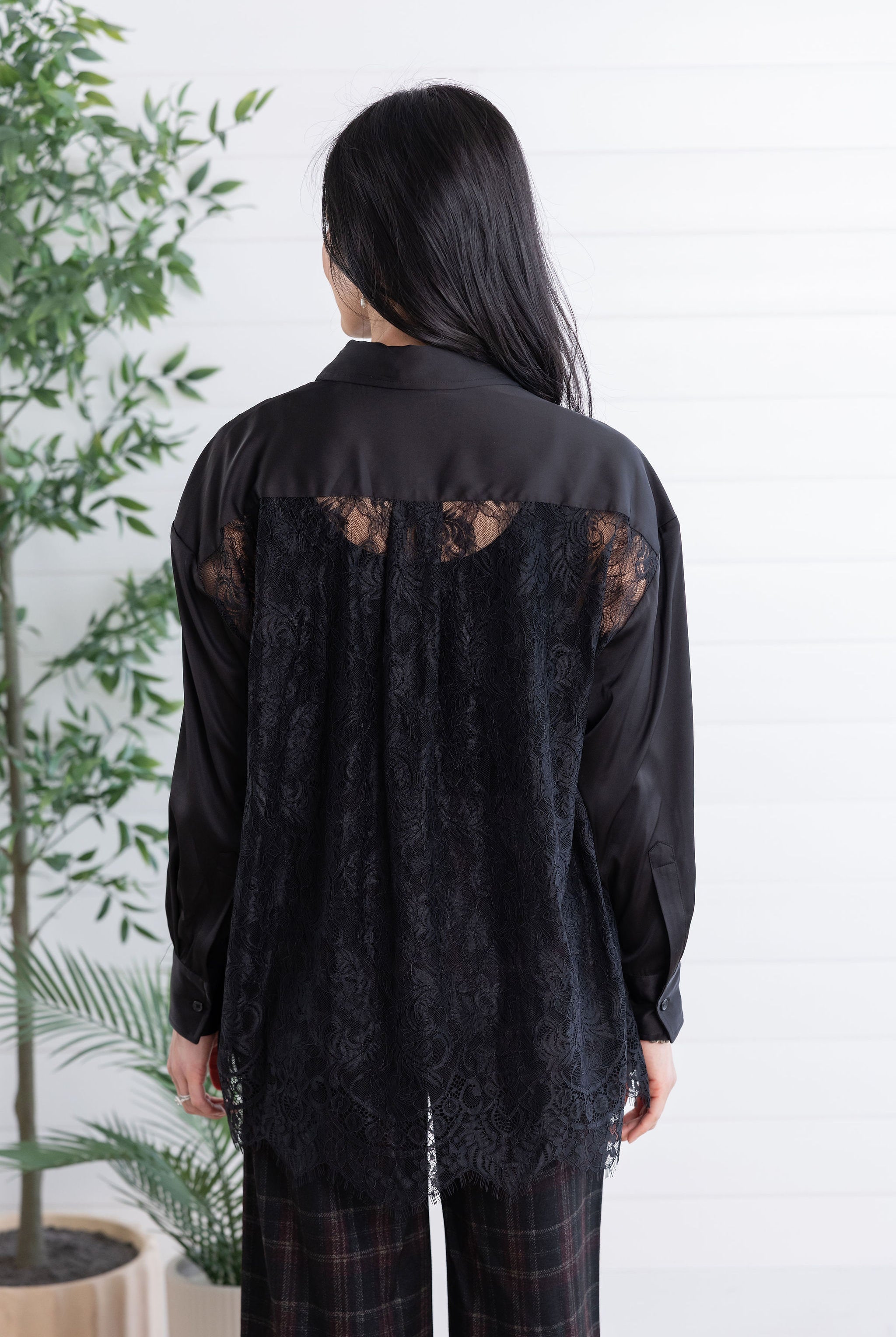 back view of lace-back button down in black