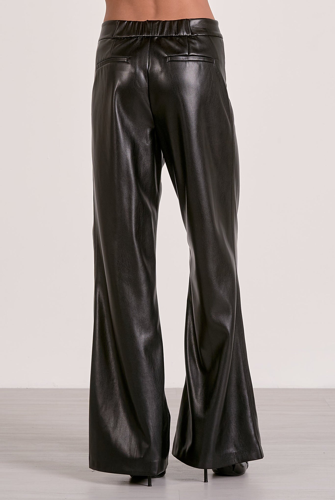 Black faux leather wide leg pant back view