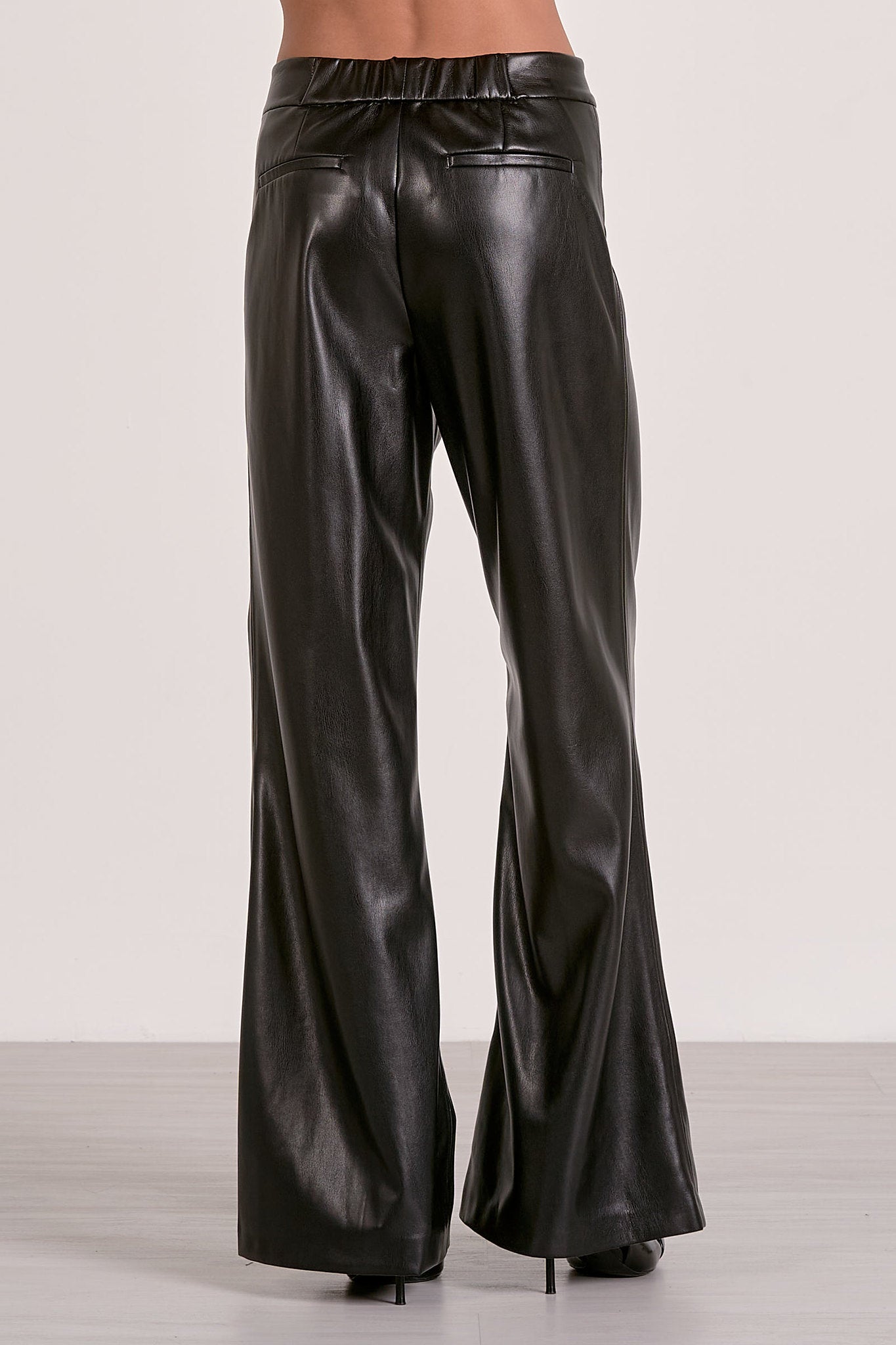 Black faux leather wide leg pant back view