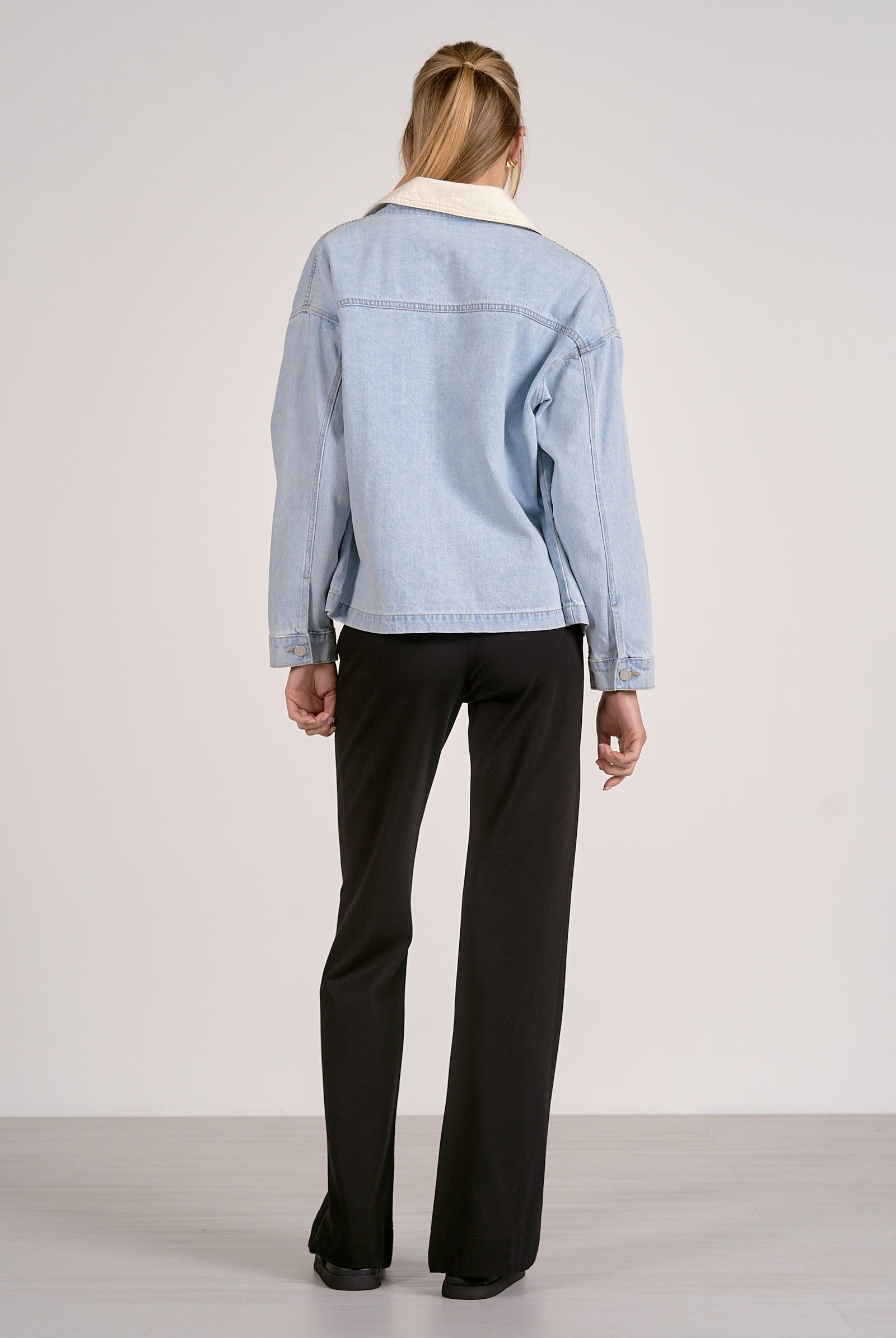 back view of light blue denim jacket