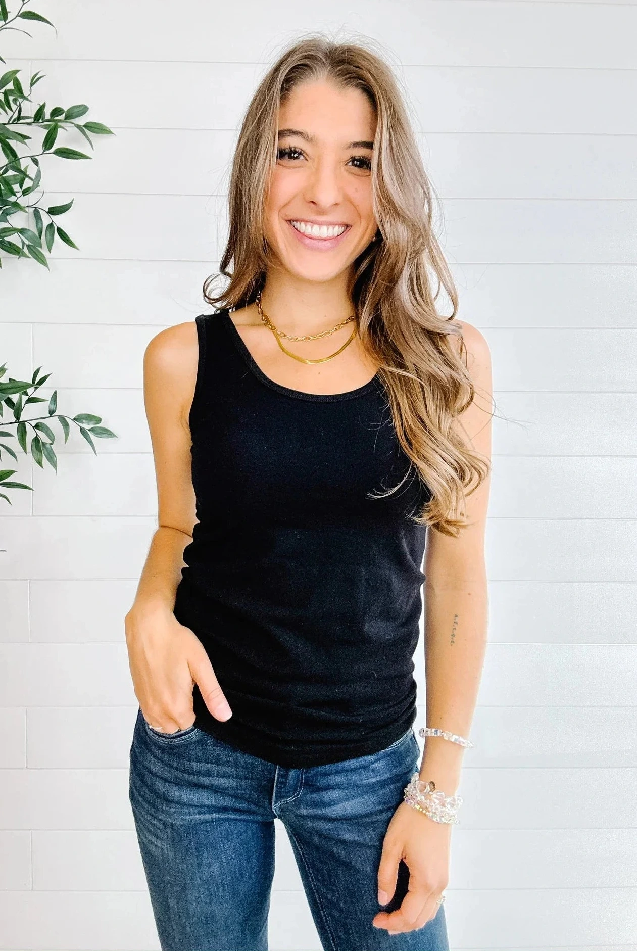 front of Mac and Me black essential fitted tank showing the scoop neck side