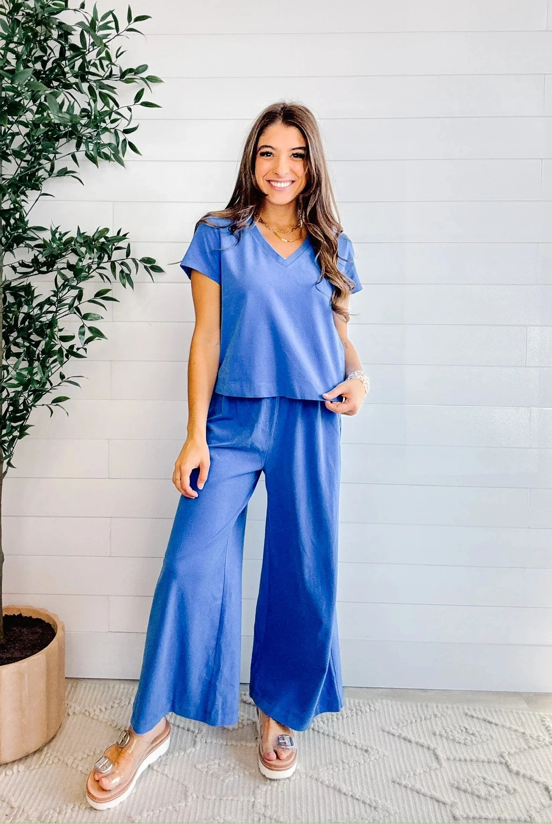 model in blue short sleeve mac and me meet and tank top