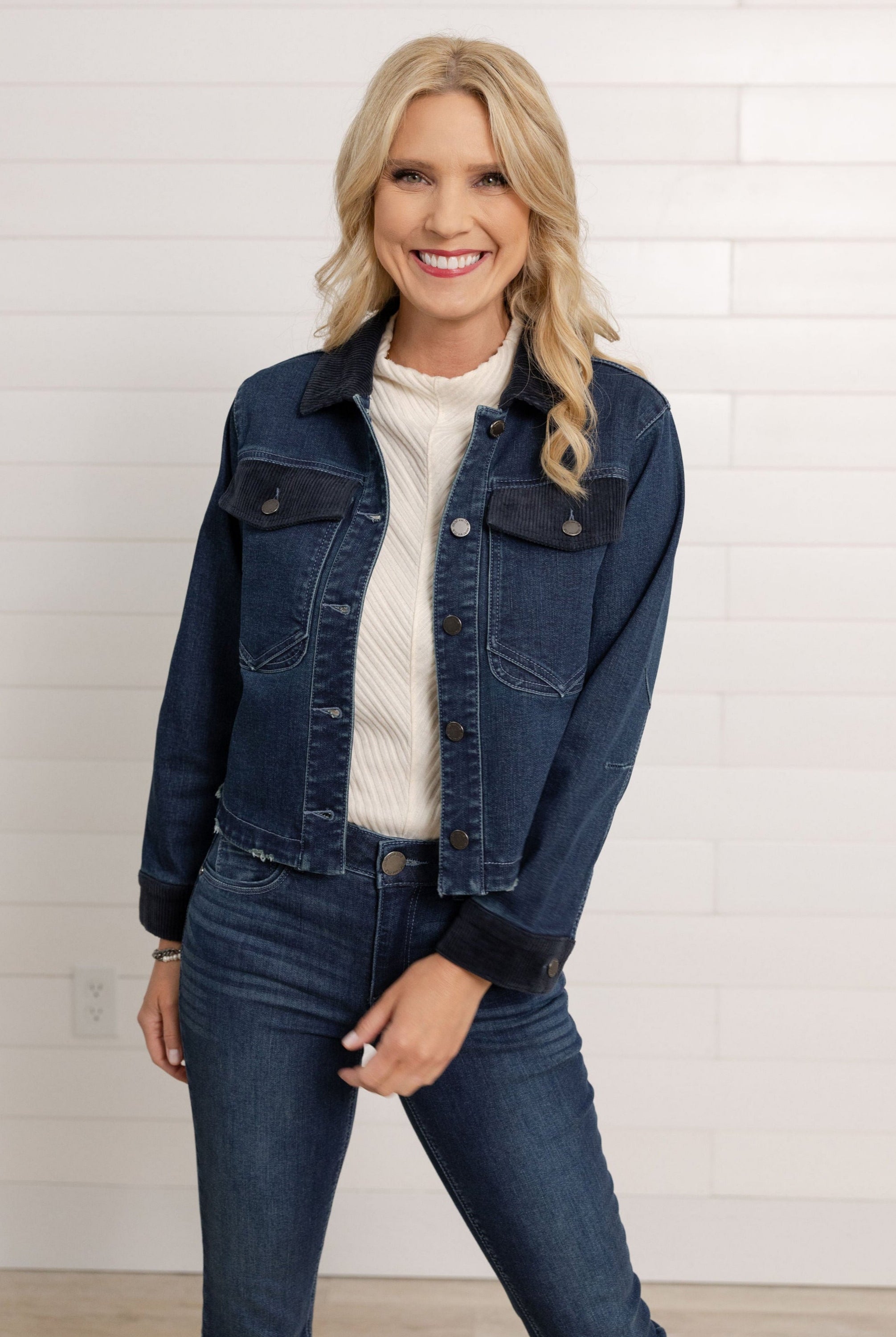 Model wearing Mac and Me Indigo Artisanal denim jacket with corduroy collar from Mainstream Boutique Bloomington, part of our $15 off Denim Days event.