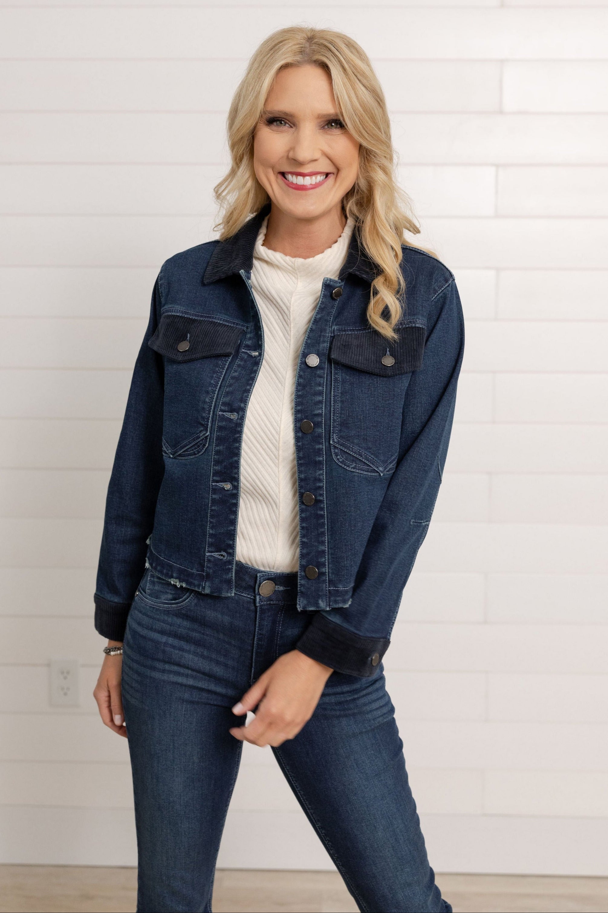 Model wearing Mac and Me Indigo Artisanal denim jacket with corduroy collar from Mainstream Boutique Bloomington, part of our $15 off Denim Days event.