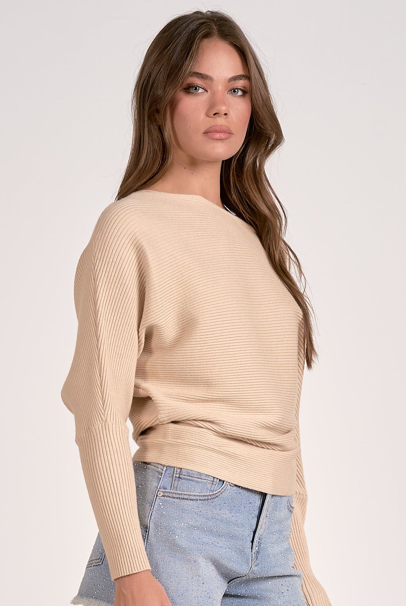 sand color off shoulder ribbed sweater styled denim
