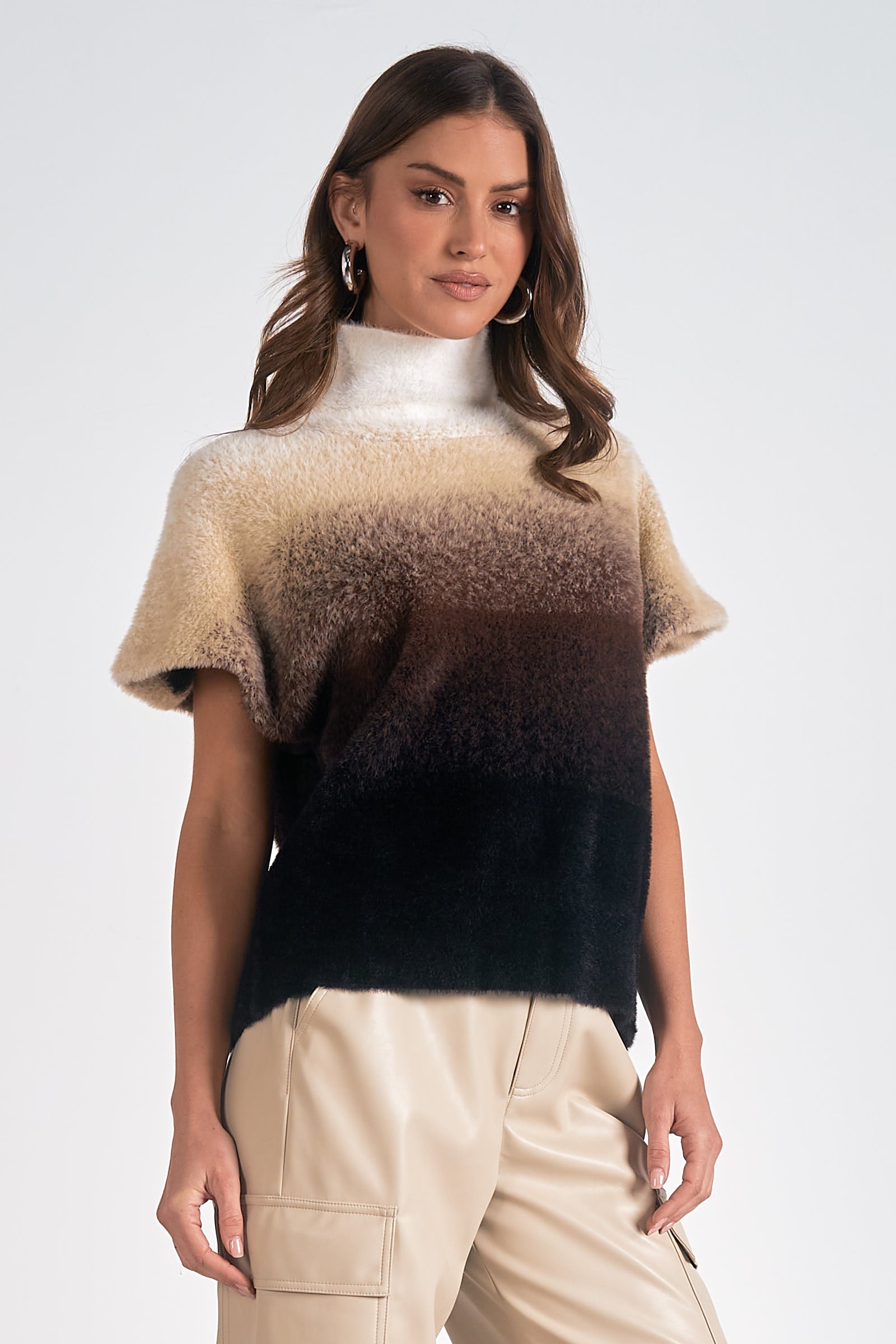 Model wearing Horizon Ombre Dolman Sweater in cream to black gradient knit with mock neck from Mainstream Boutique Bloomington