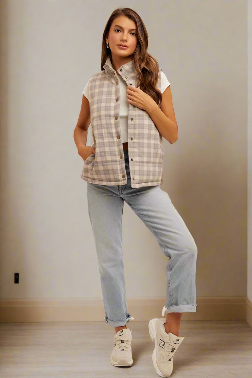 Girl wearing plaid vest