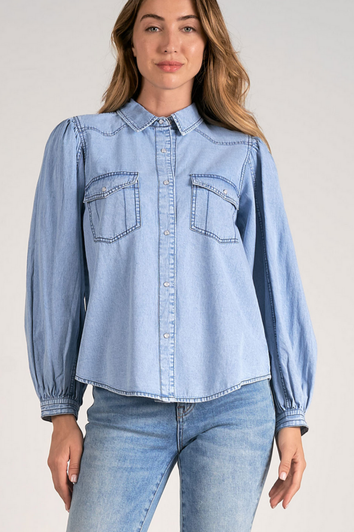 Model wearing classic long sleeve cotton button down top with puff sleeves from Mainstream Boutique Bloomington, styled for fall.