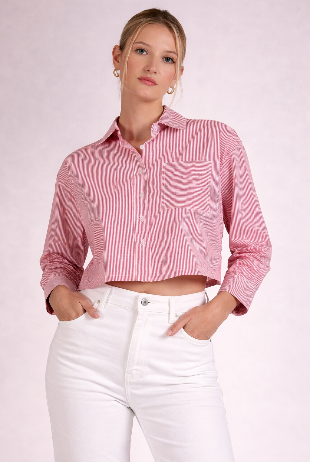 Red stripe button front top with collared neckline, button front closure, and front pocket detail paired with white denim