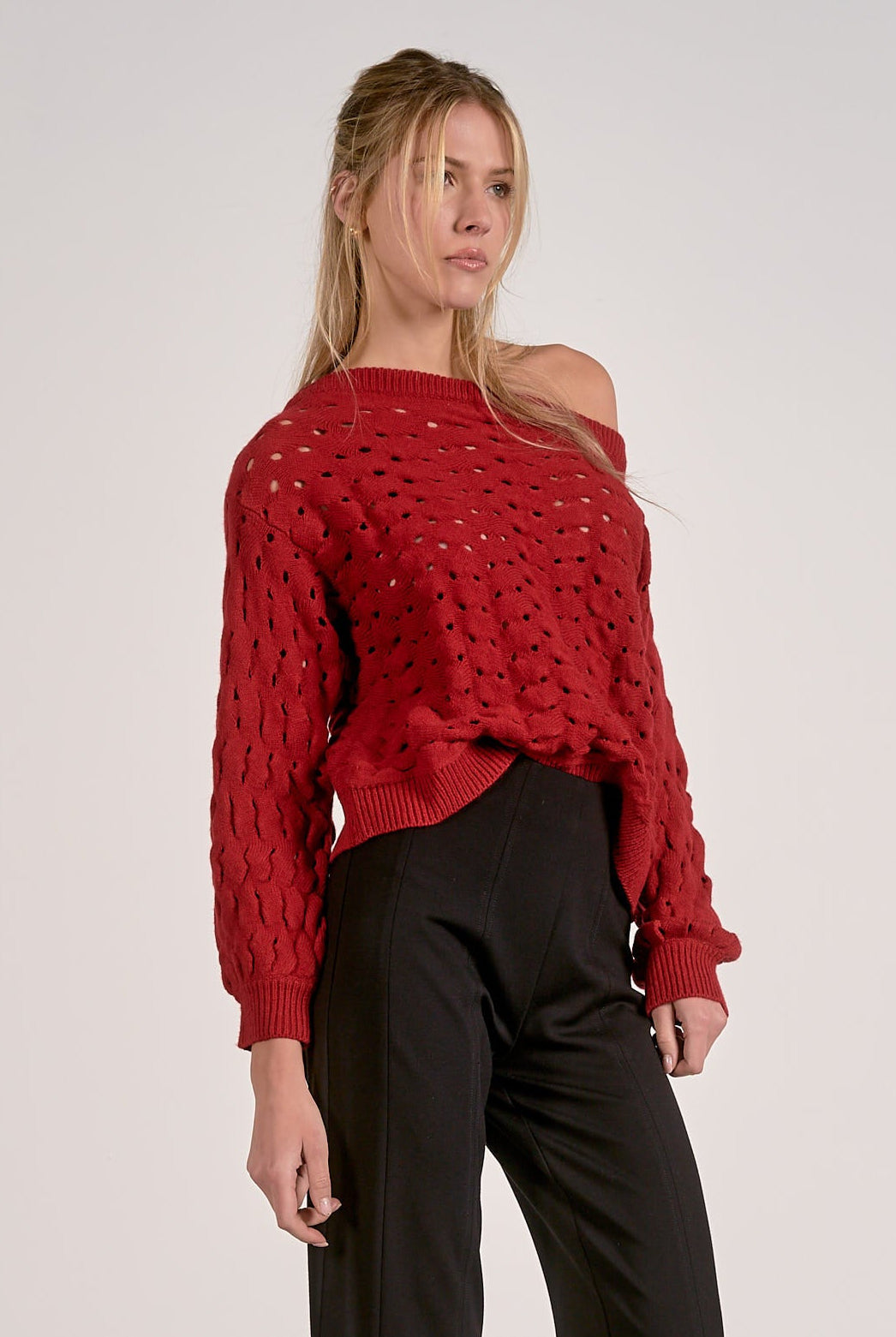 Red open stitch knit sweater with textured lightweight knit