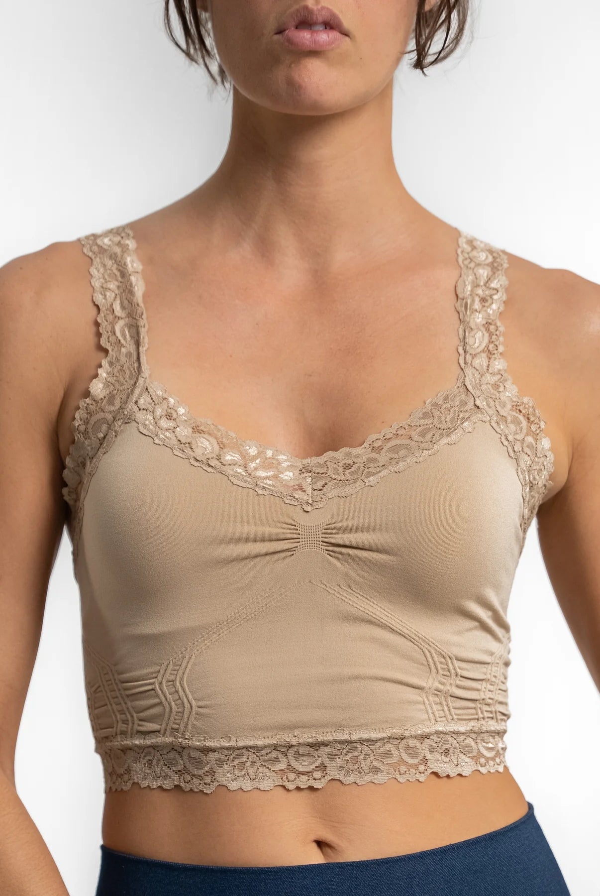 Front of the tan bralette with lace edging