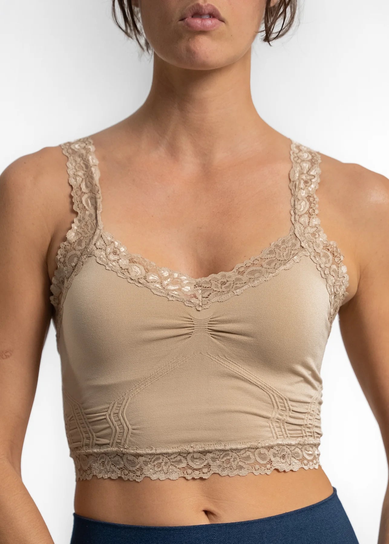 Front of the tan bralette with lace edging