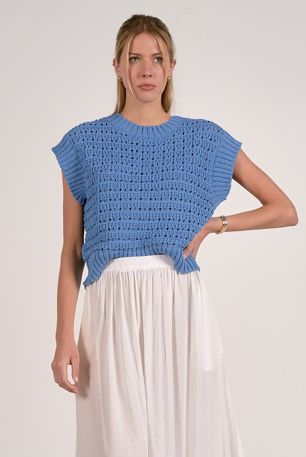 Vibrant blue textured open knit cap sleeve sweater with ribbed trim
