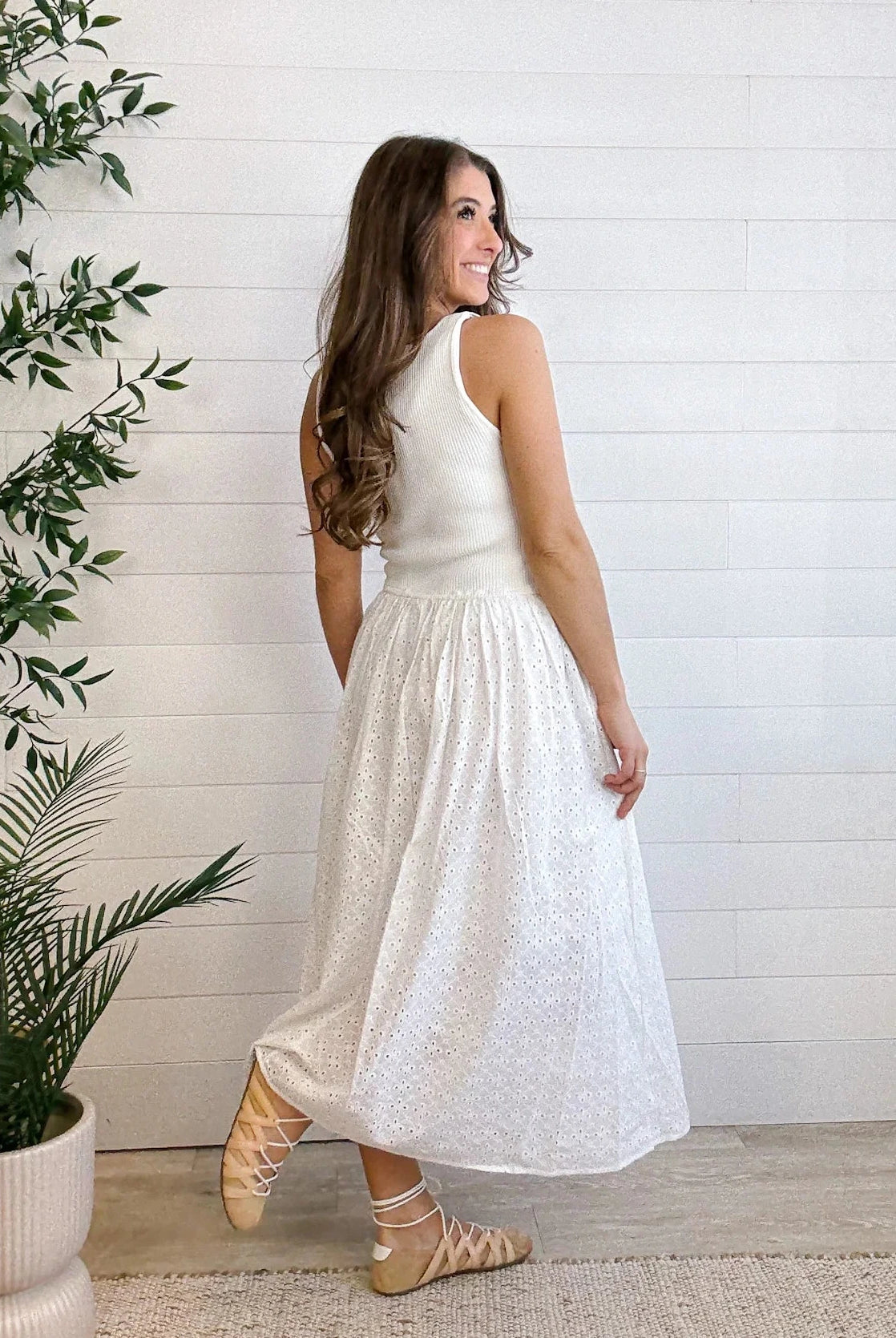 woman modeling the back of Mixed Media Eyelet Midi Dress in white
