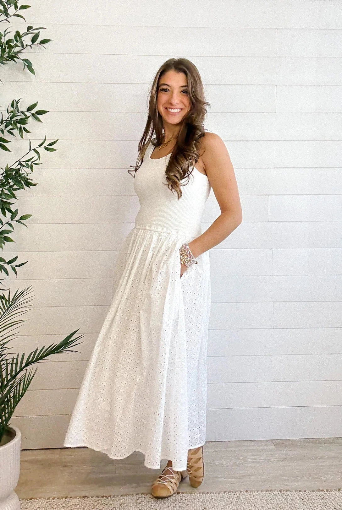 woman modeling the Mixed Media Eyelet Midi Dress in white