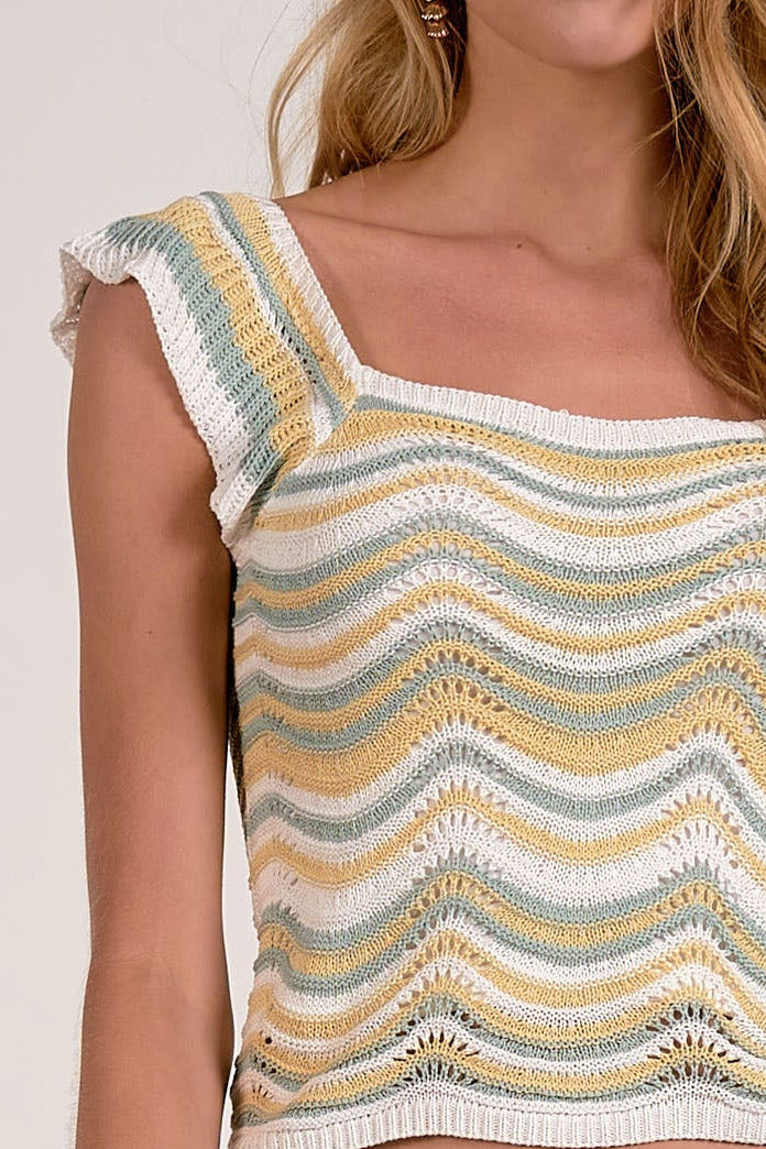 details on white multi knit tank with ruffle cap sleeve