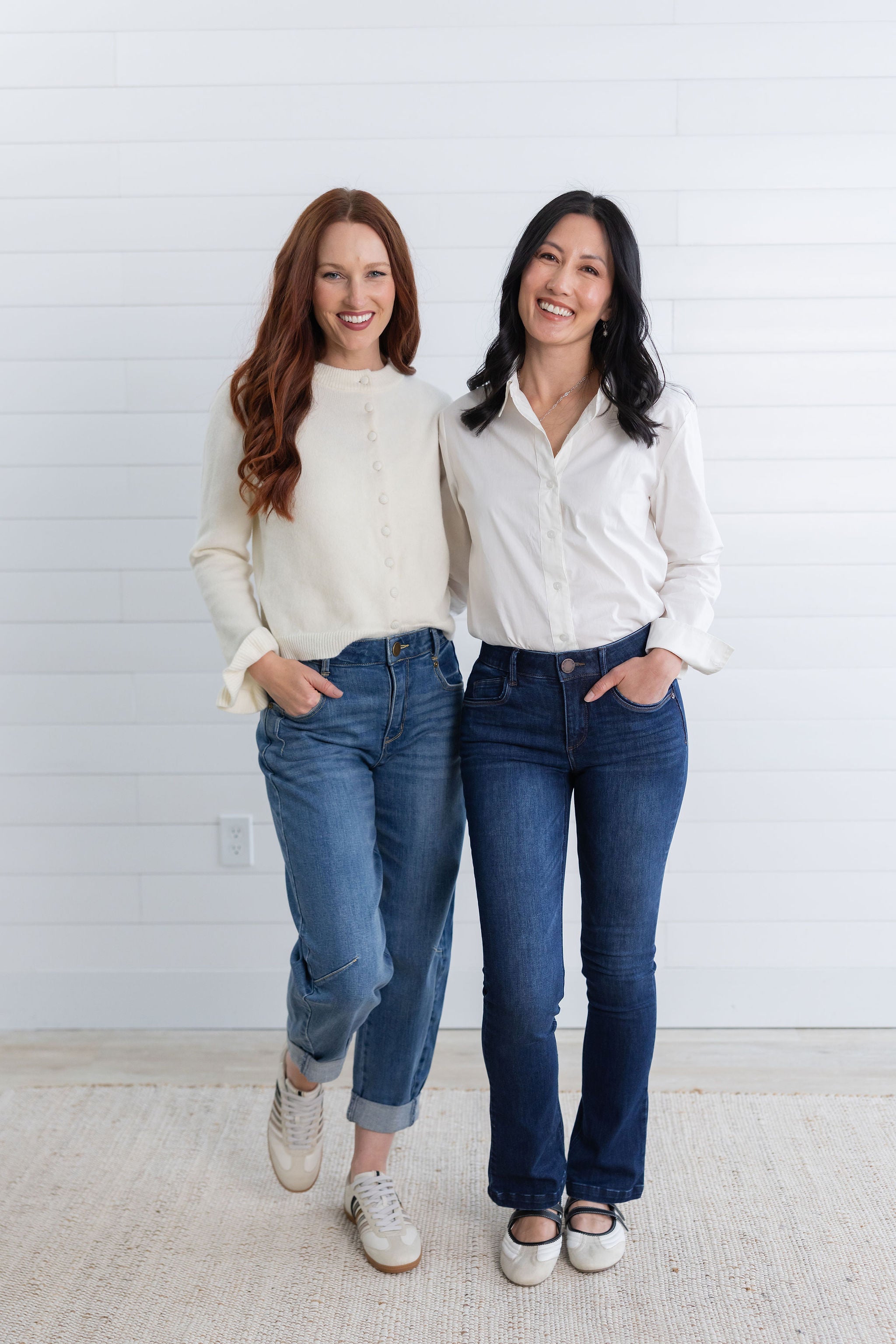 woman in button front navy blue collared top and white mac and me denim pants