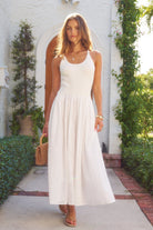 model walking in Mixed Media Eyelet Midi Dress in white