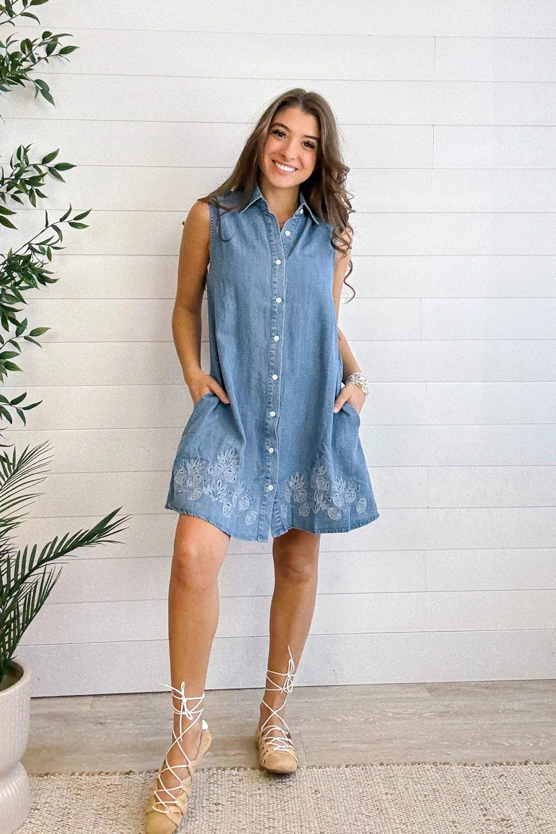 model showing front of Chambray Sleeveless Button Front Shirtdress