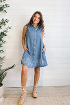 model showing front of Chambray Sleeveless Button Front Shirtdress